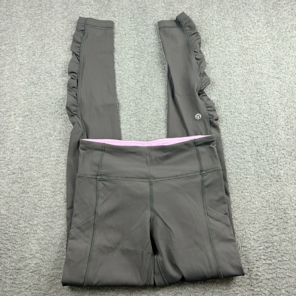 Lululemon Dark Gray Ruffle Hem Women's Size 2‎ Leggings Pockets and Pink Trim